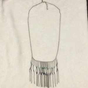 Silver necklace with dangling beads